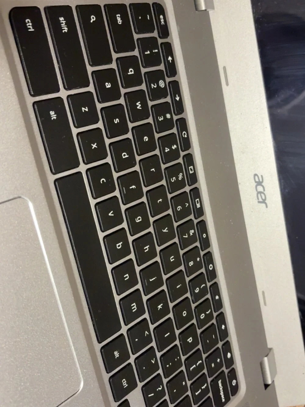 Acer touchscreen Silver Laptop with Black Keys and Large Trackpad